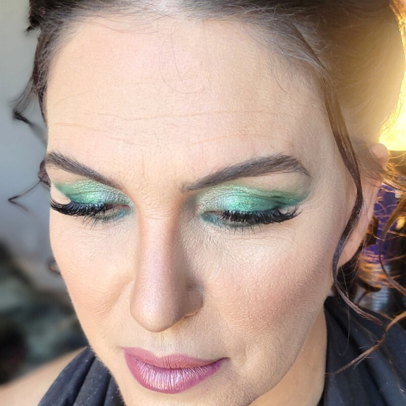 Bold event glam with a green smoky eye by LMB.