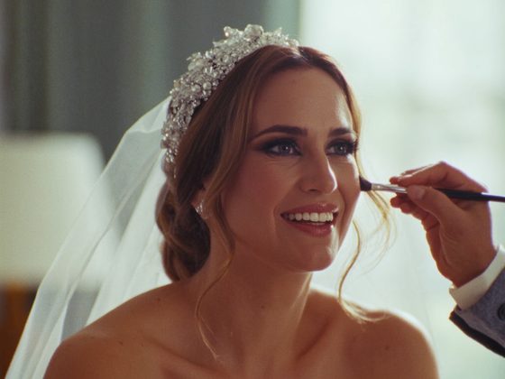 Bride receiving on-location makeup